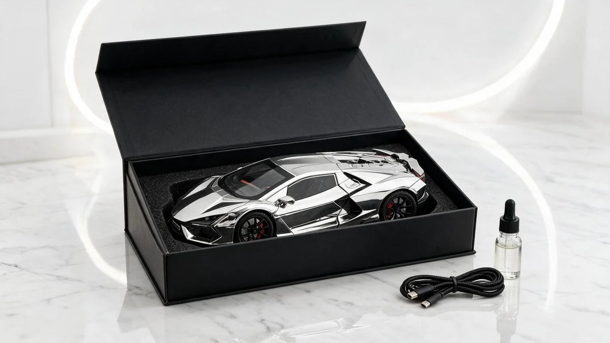 Silver chrome V12 model in its gift box with mist oil dropper and charging cable