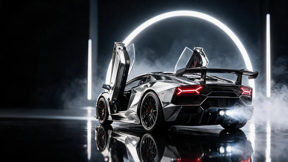 Silver chrome V12 model rear view with doors open and exhaust mist